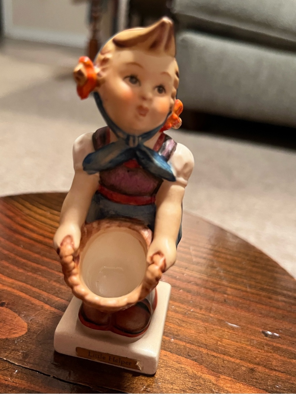 Hummel figurine, "Little Helper" (#73), girl holding an empty basket